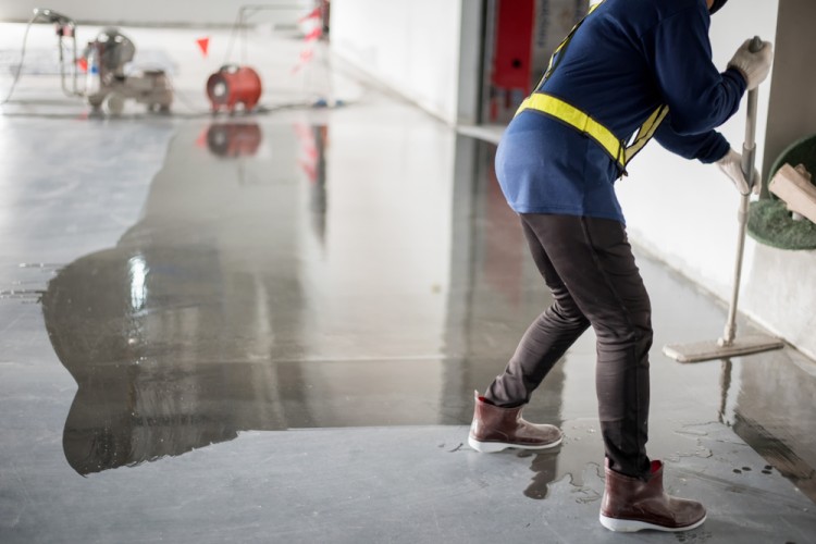 Man Applying Water Based Concrete Sealer 1