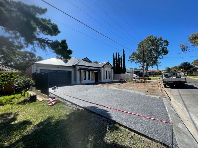 Exposed Aggregate Retarder Used In Driveway